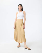 Load image into Gallery viewer, Model wearing Leo & Ugo Malia Satin Skirt in Beige.