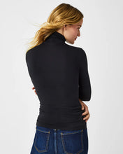 Load image into Gallery viewer, Model wearing Spanx - Long Sleeve Turtleneck in Black - back.