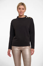Load image into Gallery viewer, Model wearing Rino & Pelle - Hanne Mock Neck Scuba Top in Black.