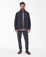 Load image into Gallery viewer, Model wearing Barbour Hybrid Fleece Jacket in Navy.