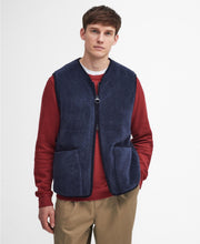 Load image into Gallery viewer, Model wearing Barbour Liddesdale Fleece Vest in Navy.