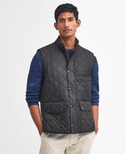 Load image into Gallery viewer, Model wearing Barbour New Lowerdale Quilted Gilet in Black.
