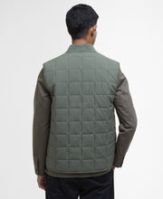 Load image into Gallery viewer, Model wearing Barbour Elmstone Quilted Gilet in Uniform Green - back.