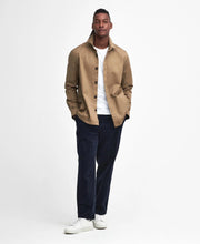 Load image into Gallery viewer, Model wearing Barbour Ruxton Tailored Stretch Twill Overshirt in Stone.