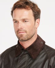Load image into Gallery viewer, Model wearing Barbour Bedale Wax Jacket in Rustic.