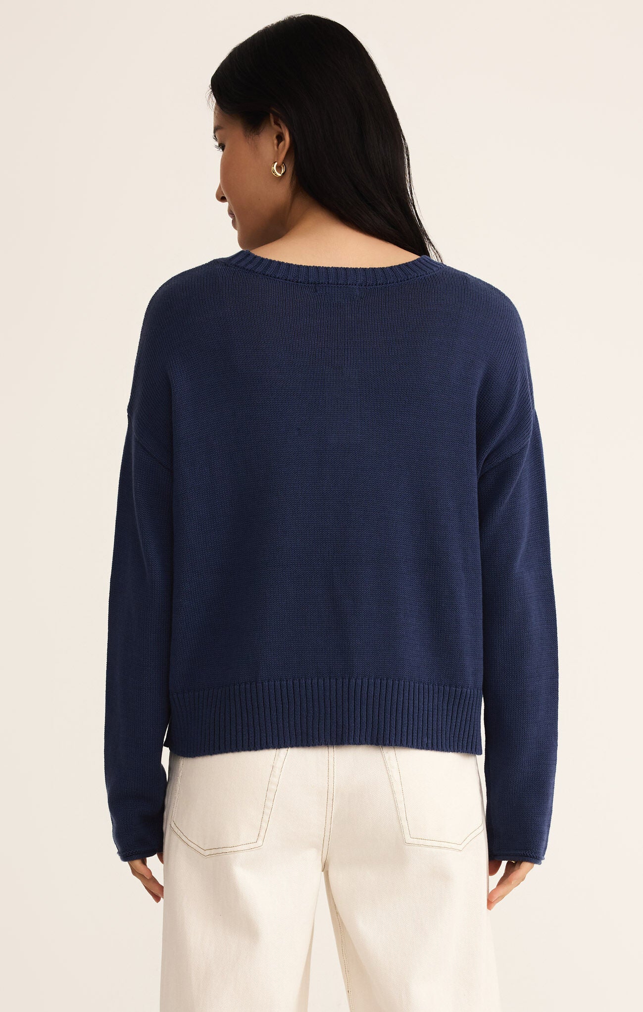 Model wearing ZSupply - Sienna USA Sweater in Yacht Blue - back.