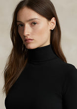 Load image into Gallery viewer, Model wearing Polo Ralph Lauren - Stretch Ribbed Turtleneck in Black.