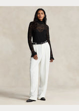 Load image into Gallery viewer, Model wearing Polo Ralph Lauren - Ruffle-Trim Pointelle-Knit Top in Black.