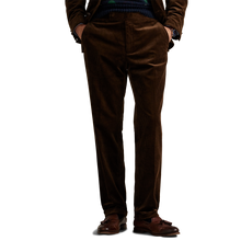Load image into Gallery viewer, Model wearing POLO Ralph Lauren - 8 Wale Corduroy Chester Trouser in Chestnut.