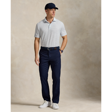 Load image into Gallery viewer, Model wearing RLX - Ralph Lauren Classic Fit Performance Polo Shirt in Office Blue Multi.