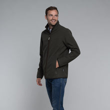 Load image into Gallery viewer, Model wearing Schoffel Men's Burrough Jacket in Forest.