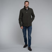 Load image into Gallery viewer, Model wearing Schoffel Men's Burrough Jacket in Forest.