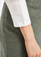 Load image into Gallery viewer, Model wearing Dubarry Snowdrop long sleeve button down shirt in white.