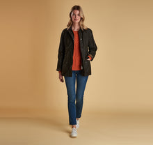 Load image into Gallery viewer, Model wearing Barbour Beadnell wax jacket in olive.