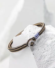 Load image into Gallery viewer, Pig & Hen Don Dino bracelet in navy / sand with silver ring.