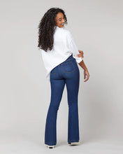 Load image into Gallery viewer, Model wearing Spanx - Flare Jeans in Midnight Shade.