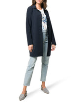 Load image into Gallery viewer, Model wearing Herno Women's Act First Scuba Snap Front Jacket in Blu Navy.