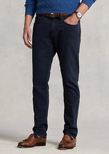 Load image into Gallery viewer, Model wearing POLO Ralph Lauren - Sullivan Slim Knitlike Chino Pant in Avaitor Navy.