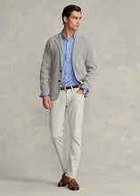 Load image into Gallery viewer, Model wearing POLO Ralph Lauren - Sullivan Slim Knitlike Chino Pant in Dove Grey.