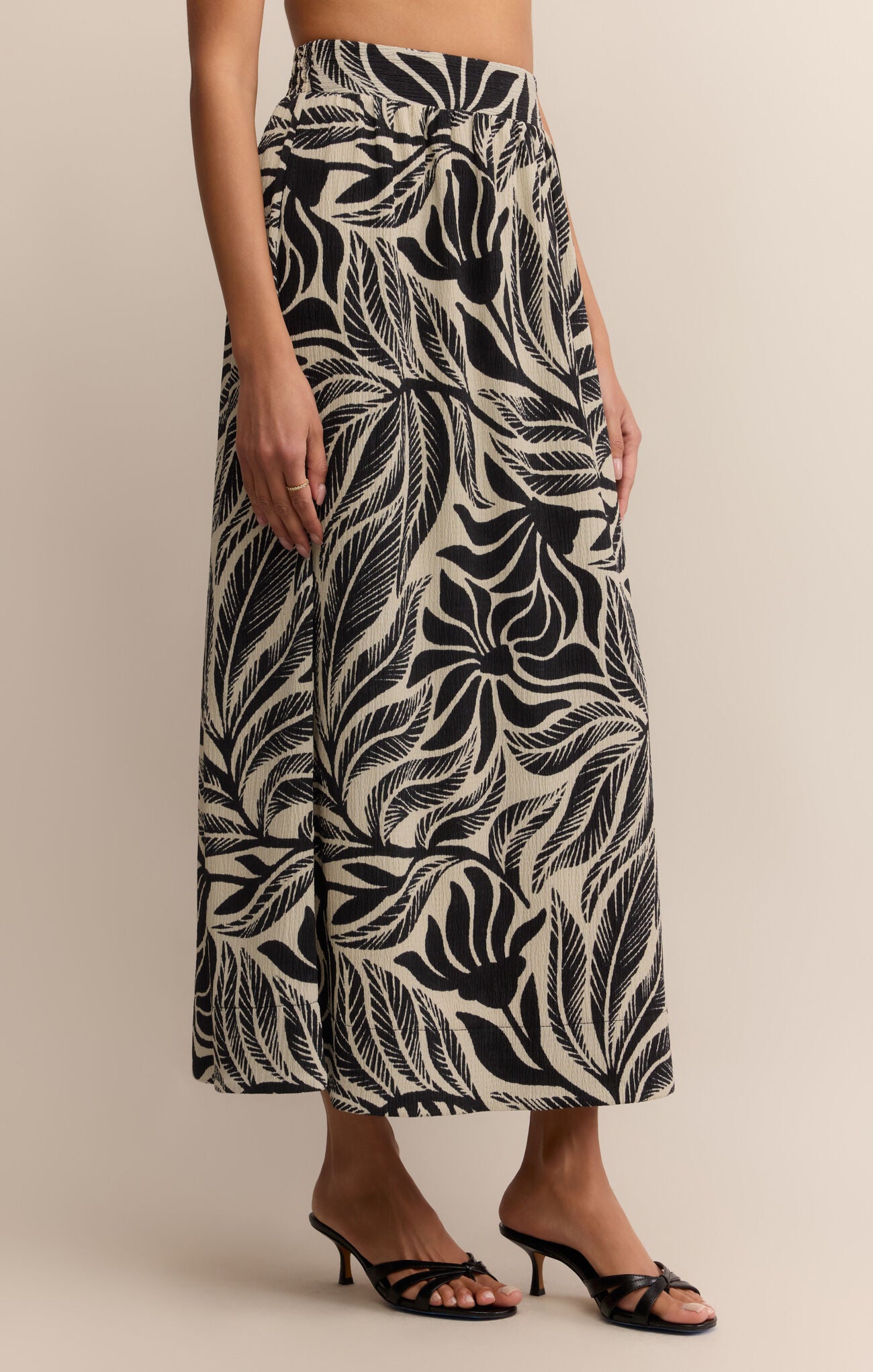 Model wearing ZSupply Serendipity Isla Leaf Skirt in Black.