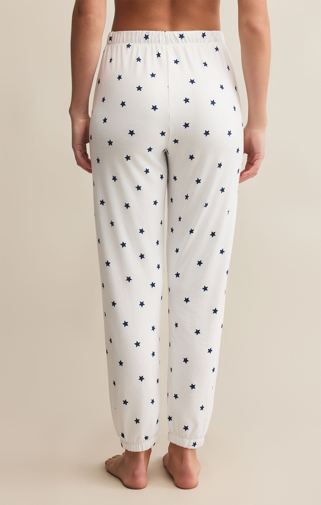 Model wearing ZSupply - Classic Mini Stars Jogger in White/Navy - back.