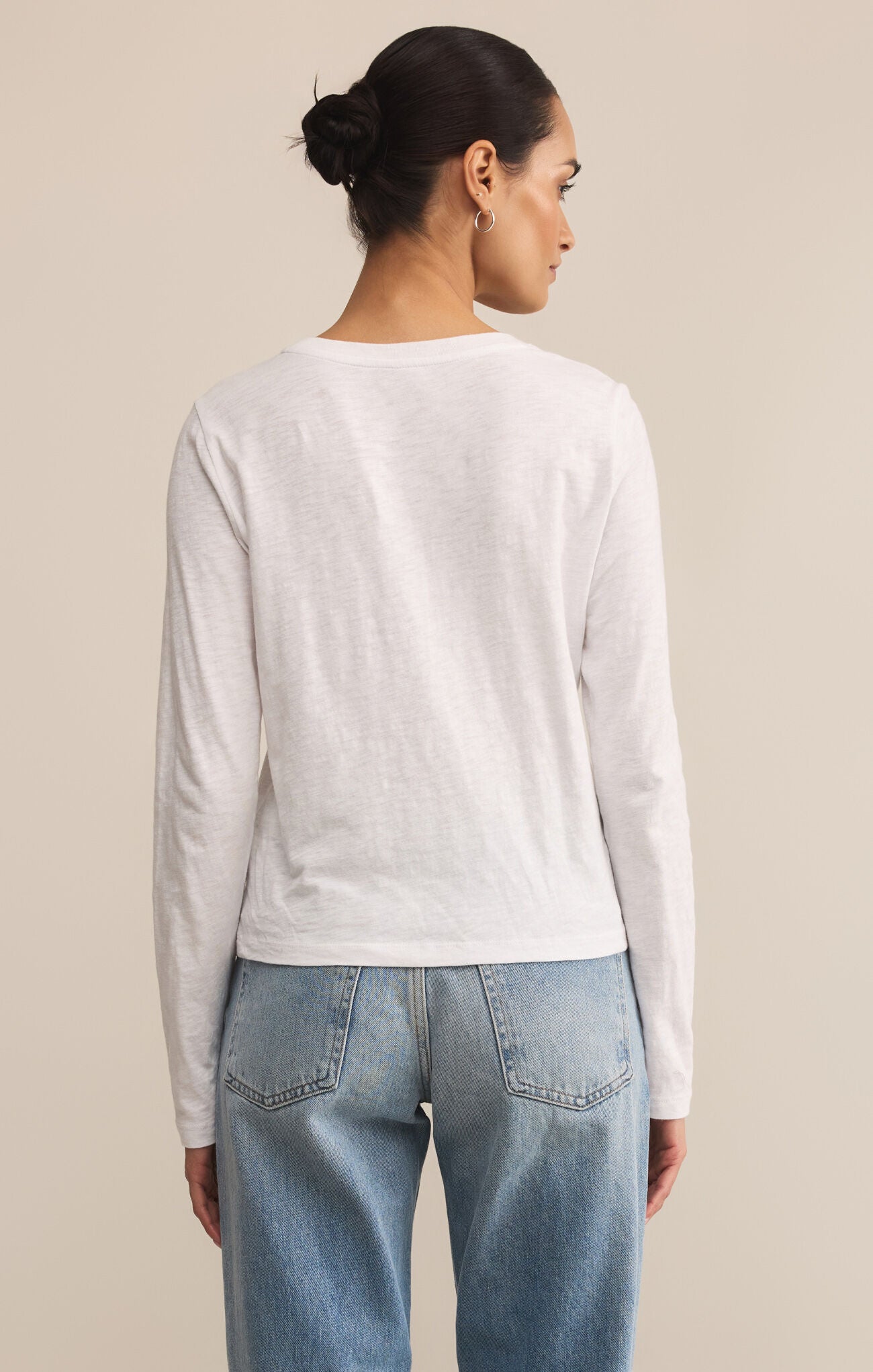 Model wearing ZSupply Modern Slub LS Tee in White - back.