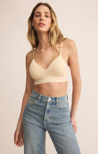 Load image into Gallery viewer, Model wearing ZSupply Kendra So Smooth Bralette in Natural Tan.

