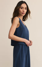 Load image into Gallery viewer, Model wearing ZSupply Solace Jersey Denim Top Indigo.
