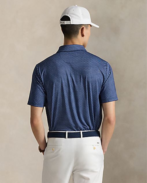 model wearing RLX- SS Lightweight Airflow Printed Polo - Navy Golf Buggy - back