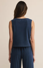 Load image into Gallery viewer, Model wearing ZSupply Solace Jersey Denim Top Indigo - back.
