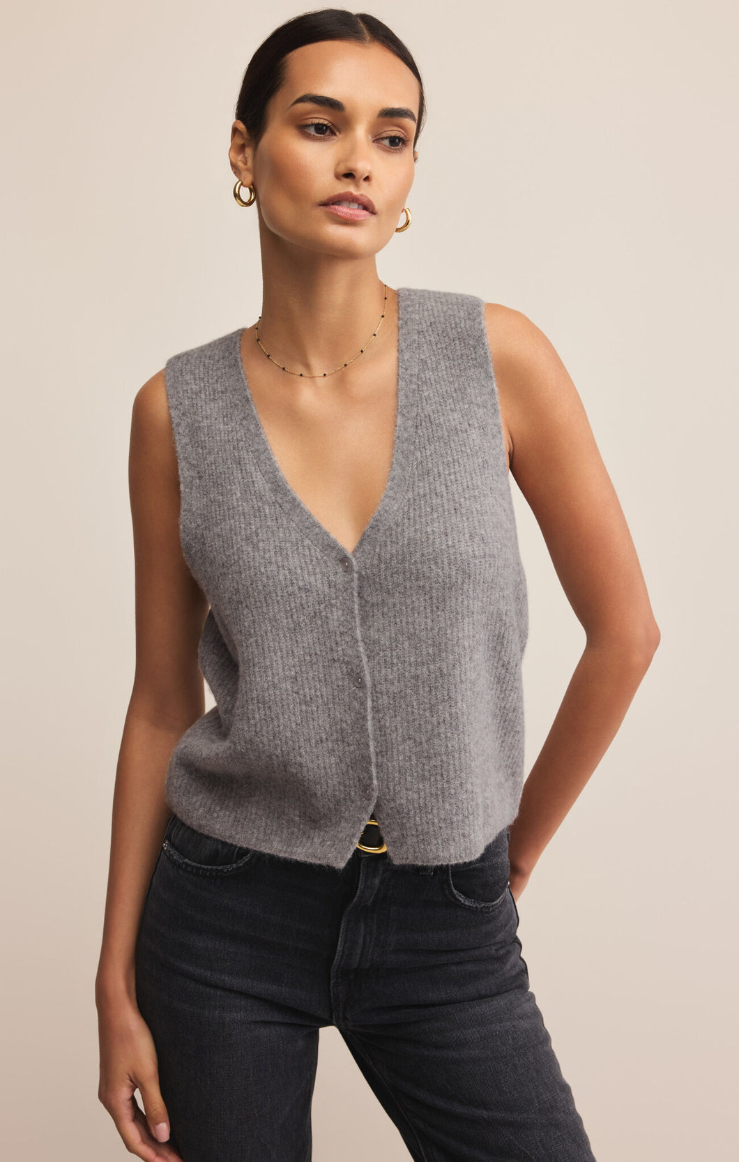 Model wearing ZSupply Bryce Sweater Vest in Medium Heather Grey.