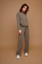 Load image into Gallery viewer, Model wearing Rino &amp; Pelle - Bindina Wide Leg Trousers in Stone Graphics.
