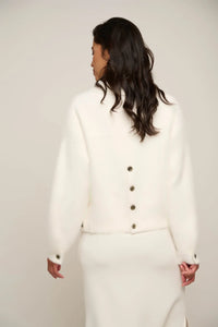 Model wearing Rino &amp; Pelle - Bubbly Sweater Jacket in Snow White - back.