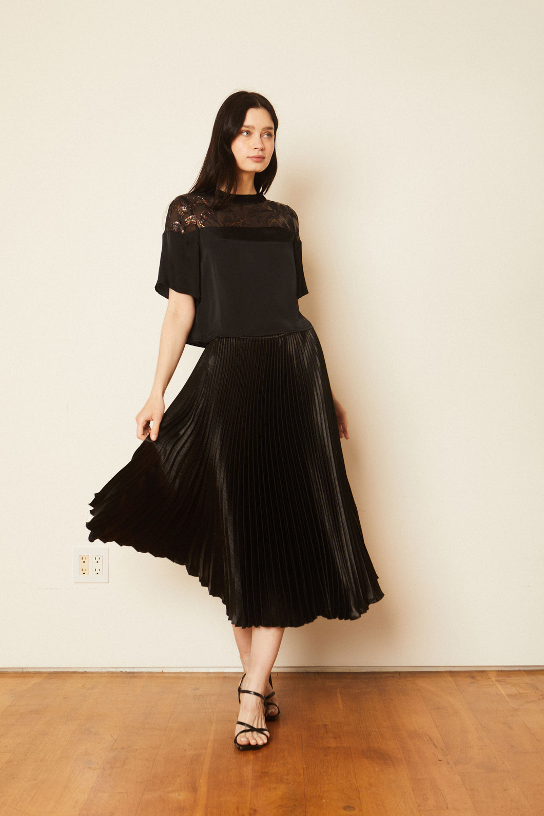 Model wearing Caballero - Gabriella Sparkle Scallop Top in Black.