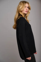 Load image into Gallery viewer, Model wearing Rino &amp; Pelle - Dinty Sweater in Black.
