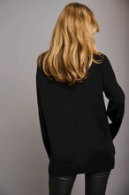 Load image into Gallery viewer, Model wearing Rino &amp; Pelle - Dinty Sweater in Black - back.
