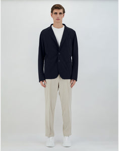 Model wearing Herno - Blazer in Non-Washed Light Scuba in Blue Navy.