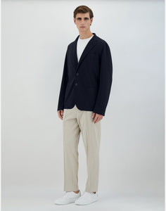 Model wearing Herno - Blazer in Non-Washed Light Scuba in Blue Navy.