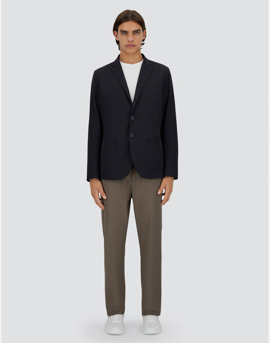 Model wearing Herno Men's Seer-Crease Blazer in Blu Navy.