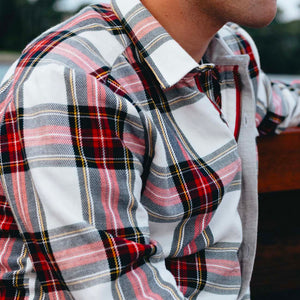 Model wearing Amundsen - Skauen Field Shirt in chequered red.