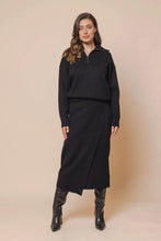 Load image into Gallery viewer, Model wearing Rino &amp; Pelle - Janou Midi Skirt in Black.
