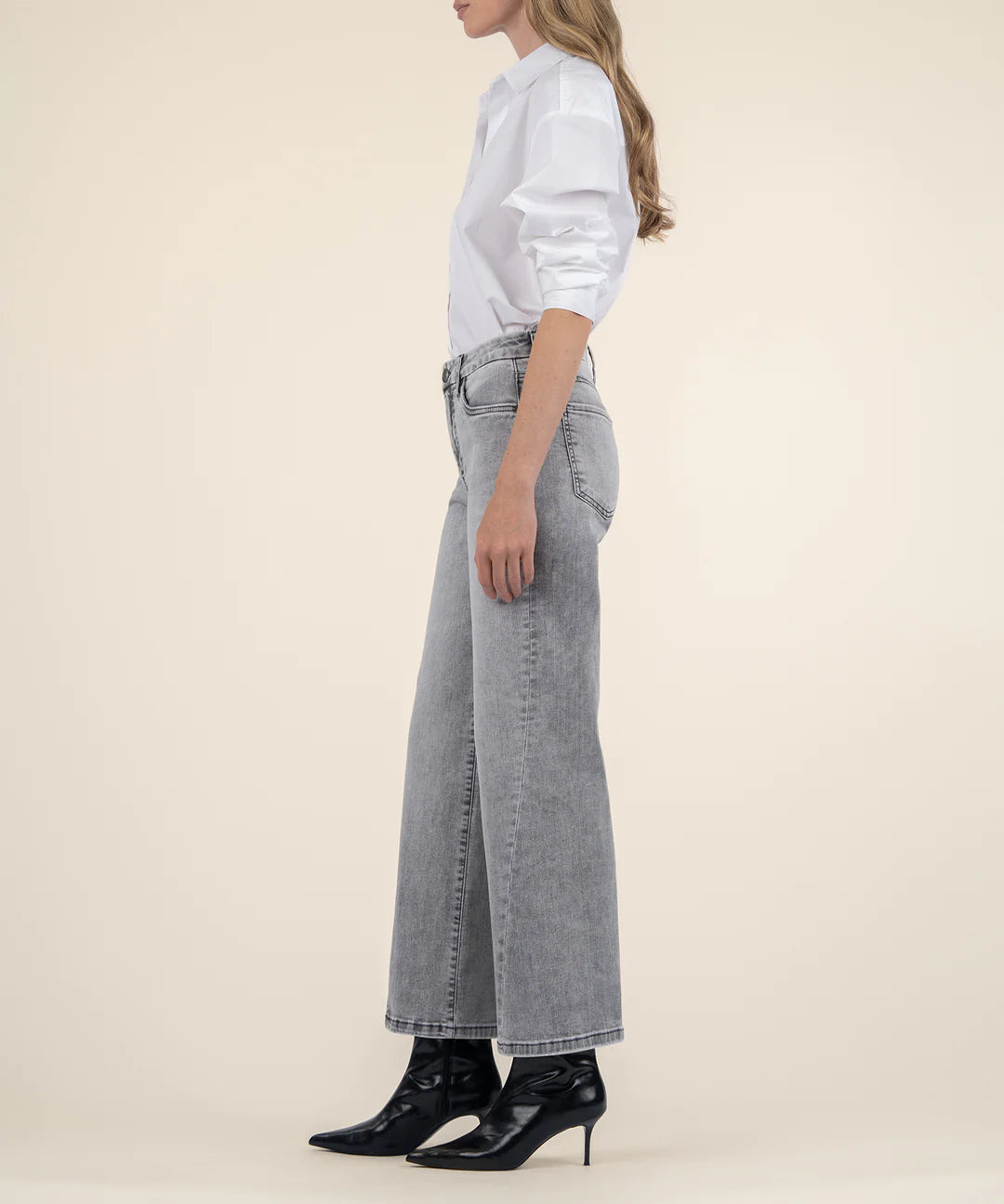 Model wearing Kut From The Kloth - MEG HIGH RISE FAB AB WIDE LEG BACK FORWARD CLEAN KG2149MA1 in Stride