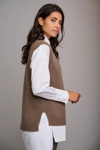 Model wearing Rino & Pelle - V-Neck Sweater Vest in Taupe.
