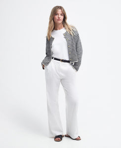 Model wearing Barbour Reil Knitted Cardigan in Multistripe.