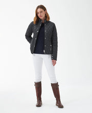 Load image into Gallery viewer, Model wearing Barbour Yarrow Quilt in Black/Rose Garden Floral.
