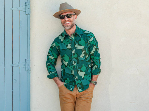 Model wearing Criquet - The J.R. Shirt in Topo Camo.