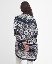 Load image into Gallery viewer, Model wearing Barbour Harewood Cape in Navy/Shell Pink - back.
