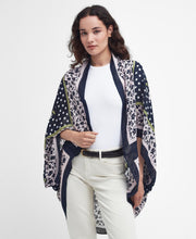 Load image into Gallery viewer, Model wearing Barbour Harewood Cape in Navy/Shell Pink.
