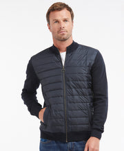 Load image into Gallery viewer, Model wearing Barbour Essential Carn Baffle Zip Thru in Navy.
