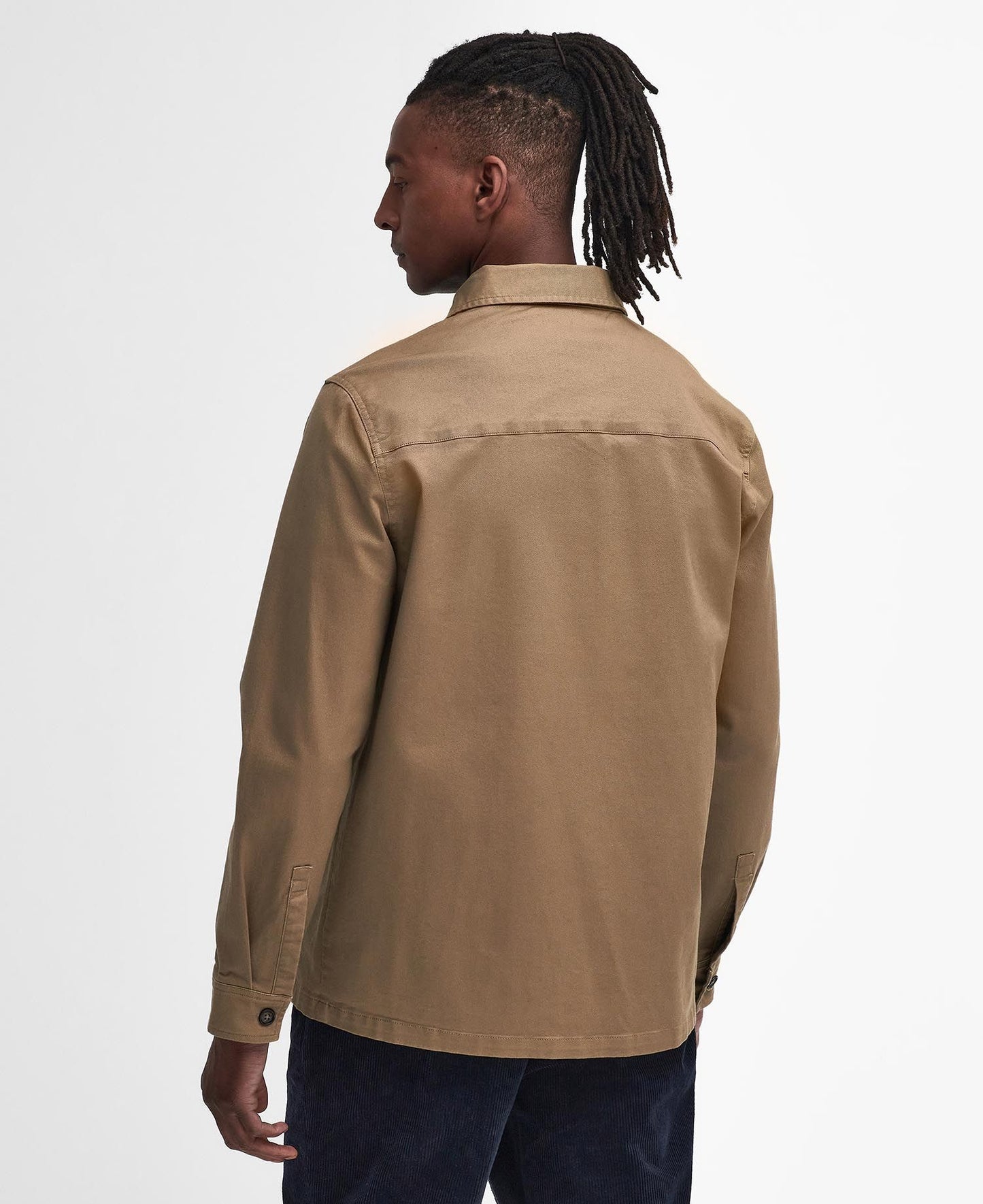 Model wearing Barbour Ruxton Tailored Stretch Twill Overshirt in Stone - back.